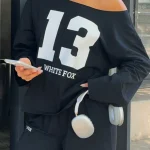 Only One Left Off Shoulder Oversized Long Sleeve Black Tee