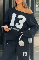 Only One Left Off Shoulder Oversized Long Sleeve Black Tee